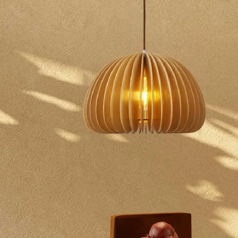Handwoven wood pendant light – shown lit