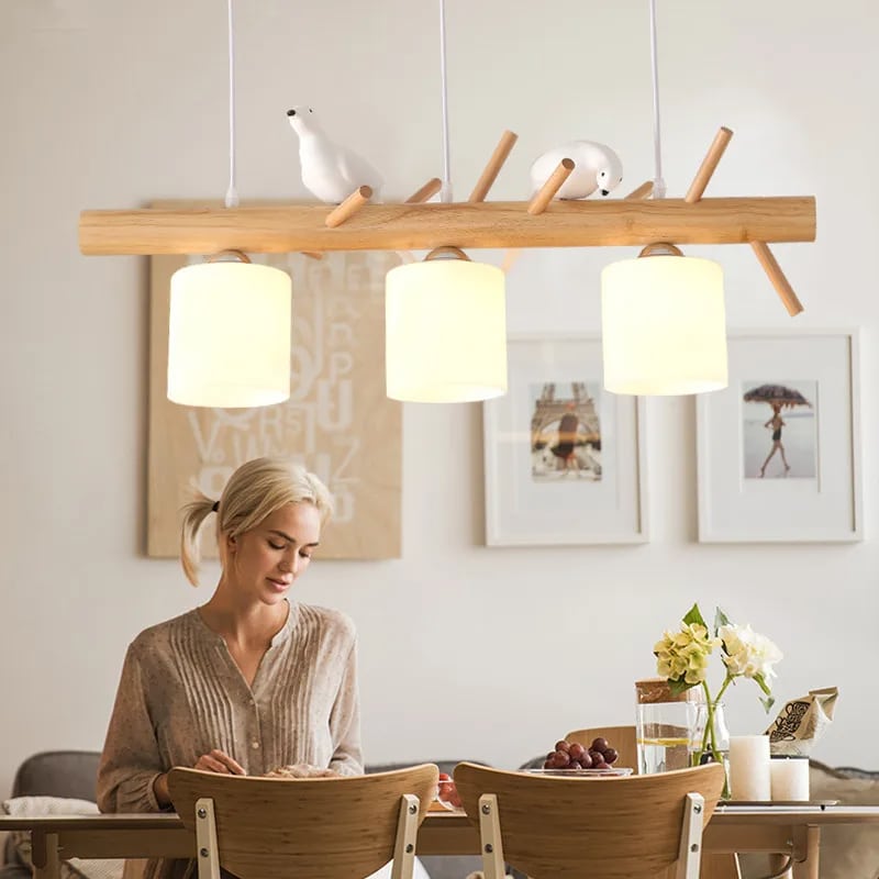 Wood branch pendant light with perched birds – shown in a room setting