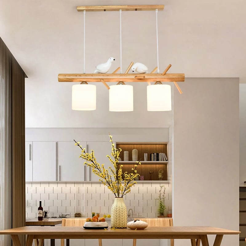 Wood branch pendant light with perched birds – shown in a room setting (3)