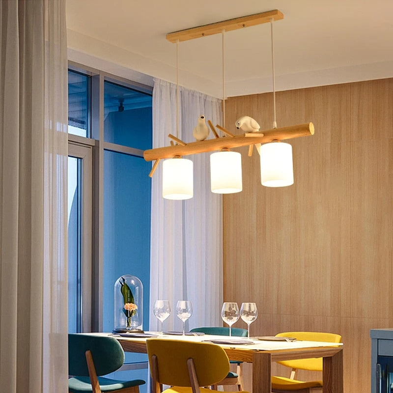 Wood branch pendant light with perched birds – shown in a room setting (4)