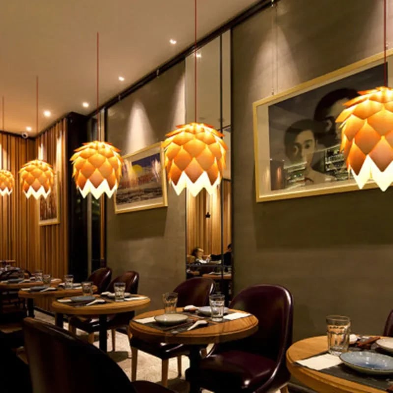 Pine cone woven wood pendant light – shown lit in a room setting (2)