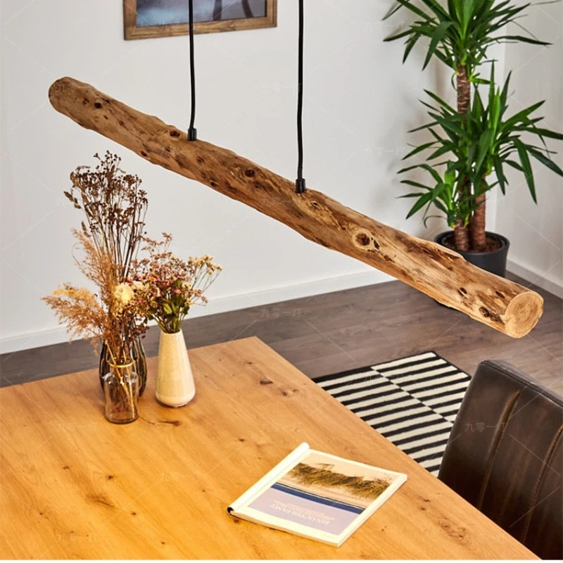 Driftwood log LED pendant light – shown in a room setting (2)