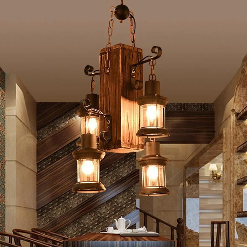 Vintage industrial driftwood beam pendant light – shown lit in a room setting