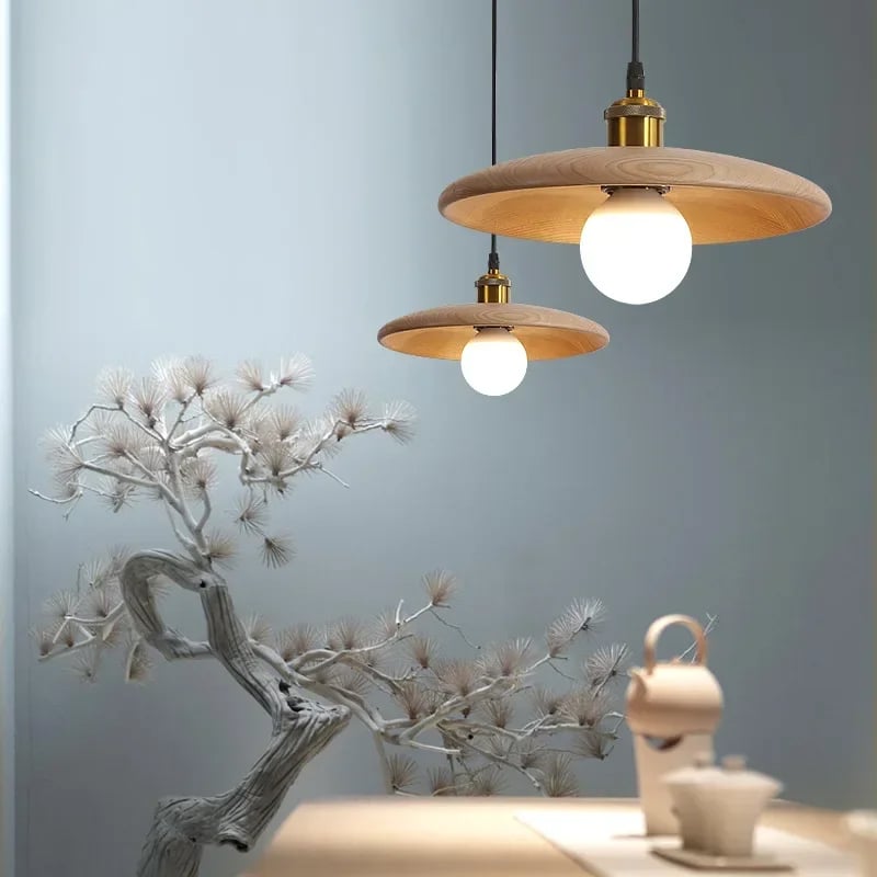 Curved arch wood pendant light – shown in a room setting