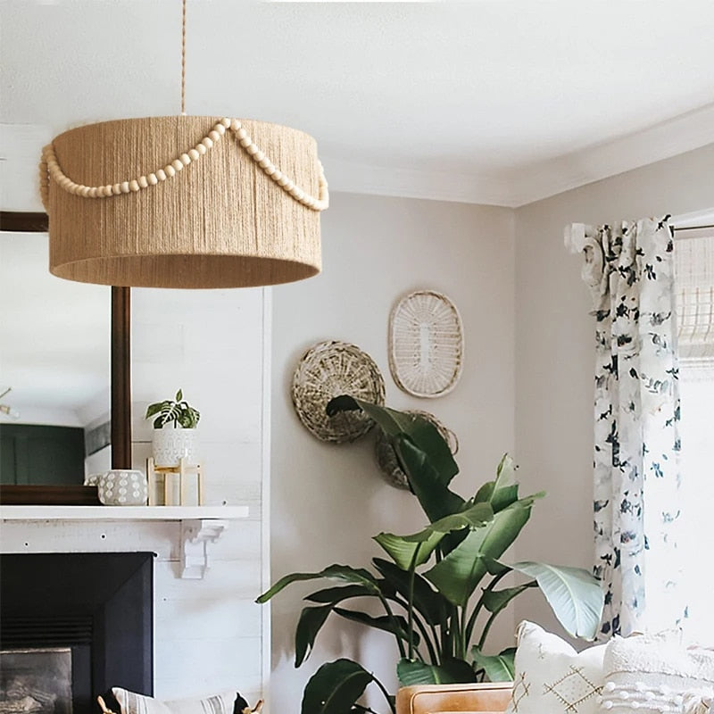 Retro rattan-look pendant light with wood beads – shown in a room setting
