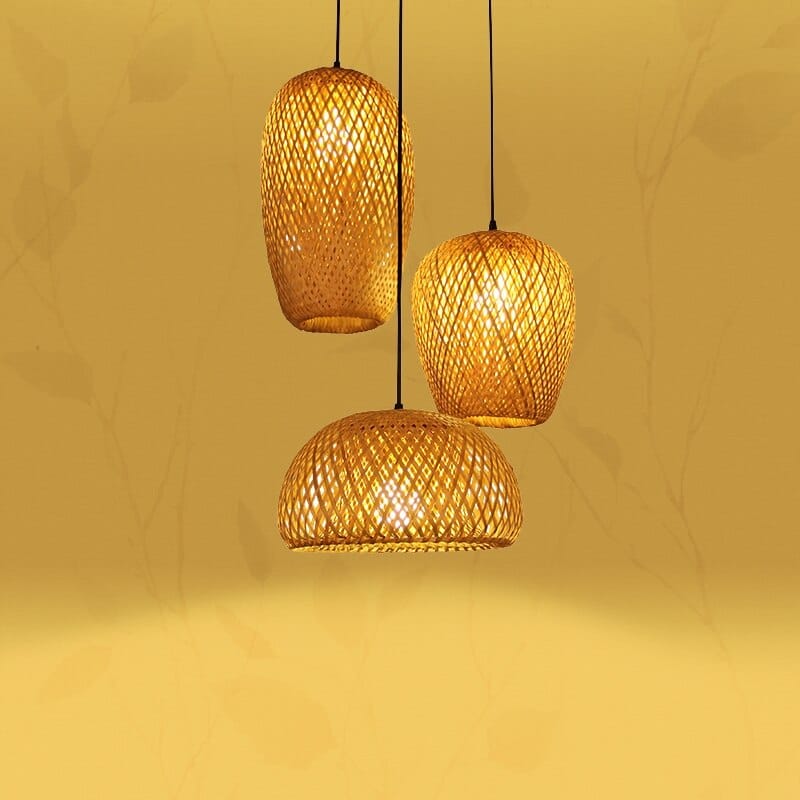 Three-shade handwoven rattan pendant light – shown lit