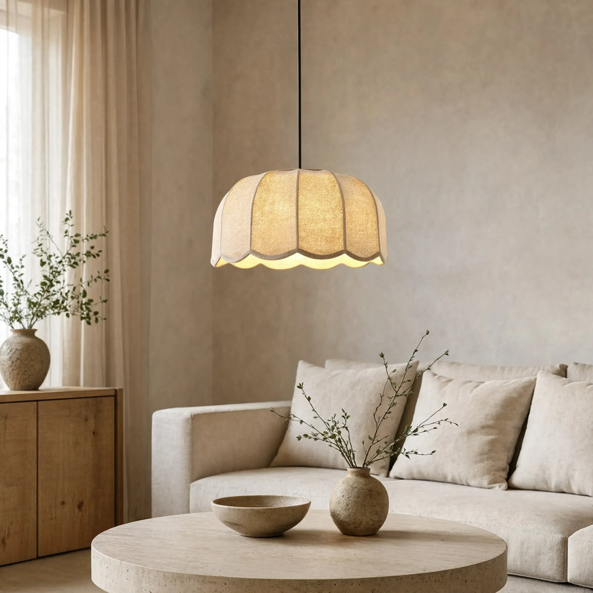 Ischia scalloped ecru fabric pendant light – shown in a living room (2)