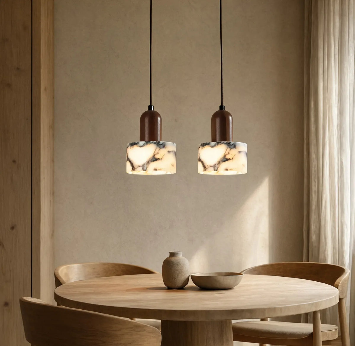 Himère marble and dark wood pendant light – shown in a dining room