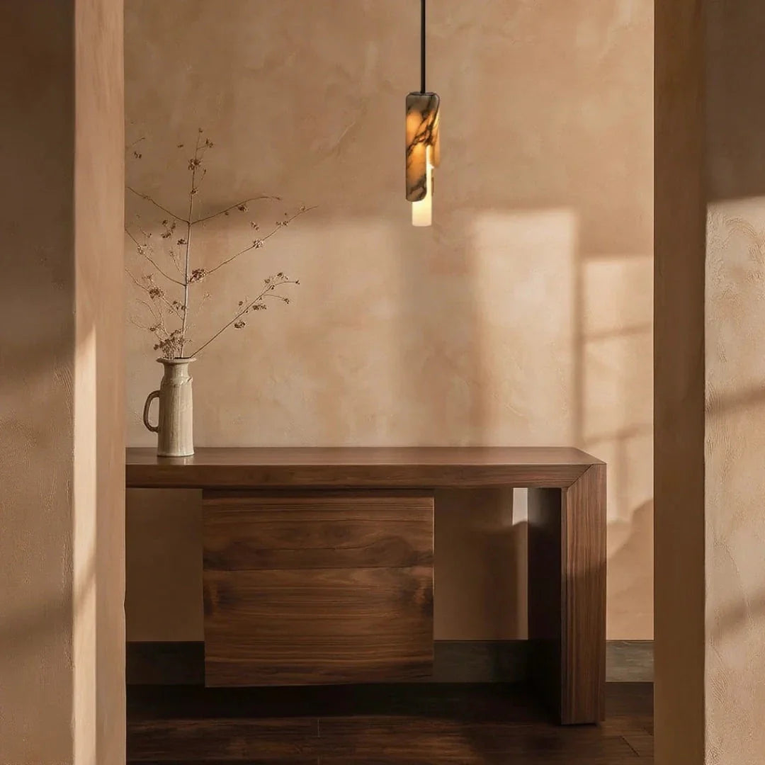 Syracuse marble column pendant light – shown in a room setting