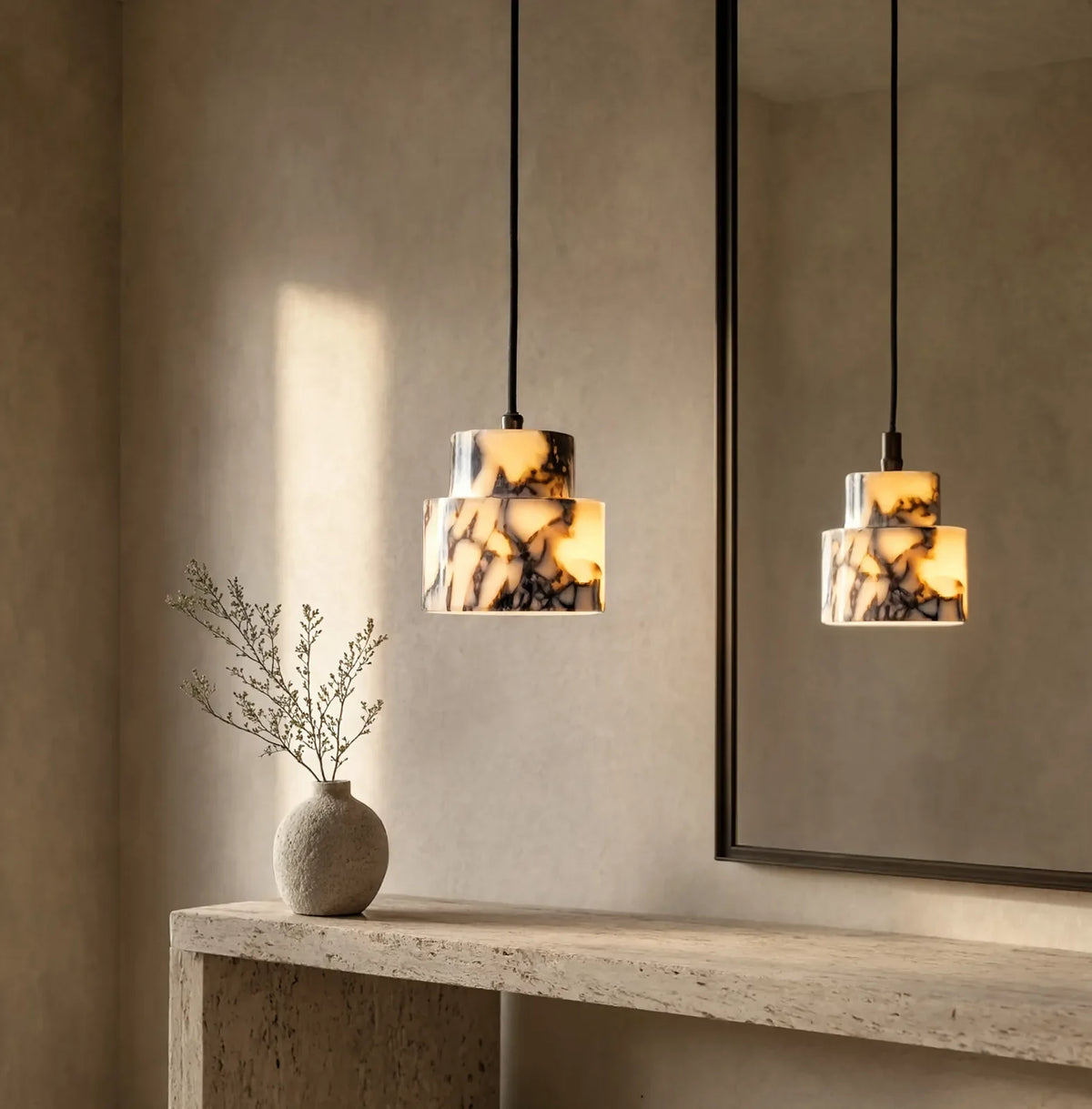 Héraclée two-tier white marble pendant light – shown in a room setting (4)