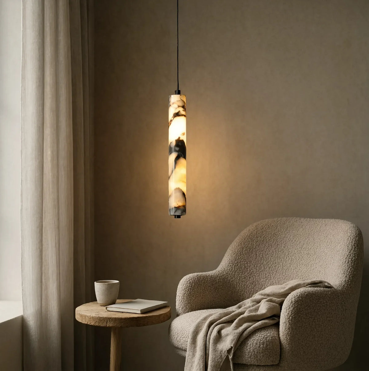 Sélinonte slim marble tube pendant light – shown in a room setting (2)