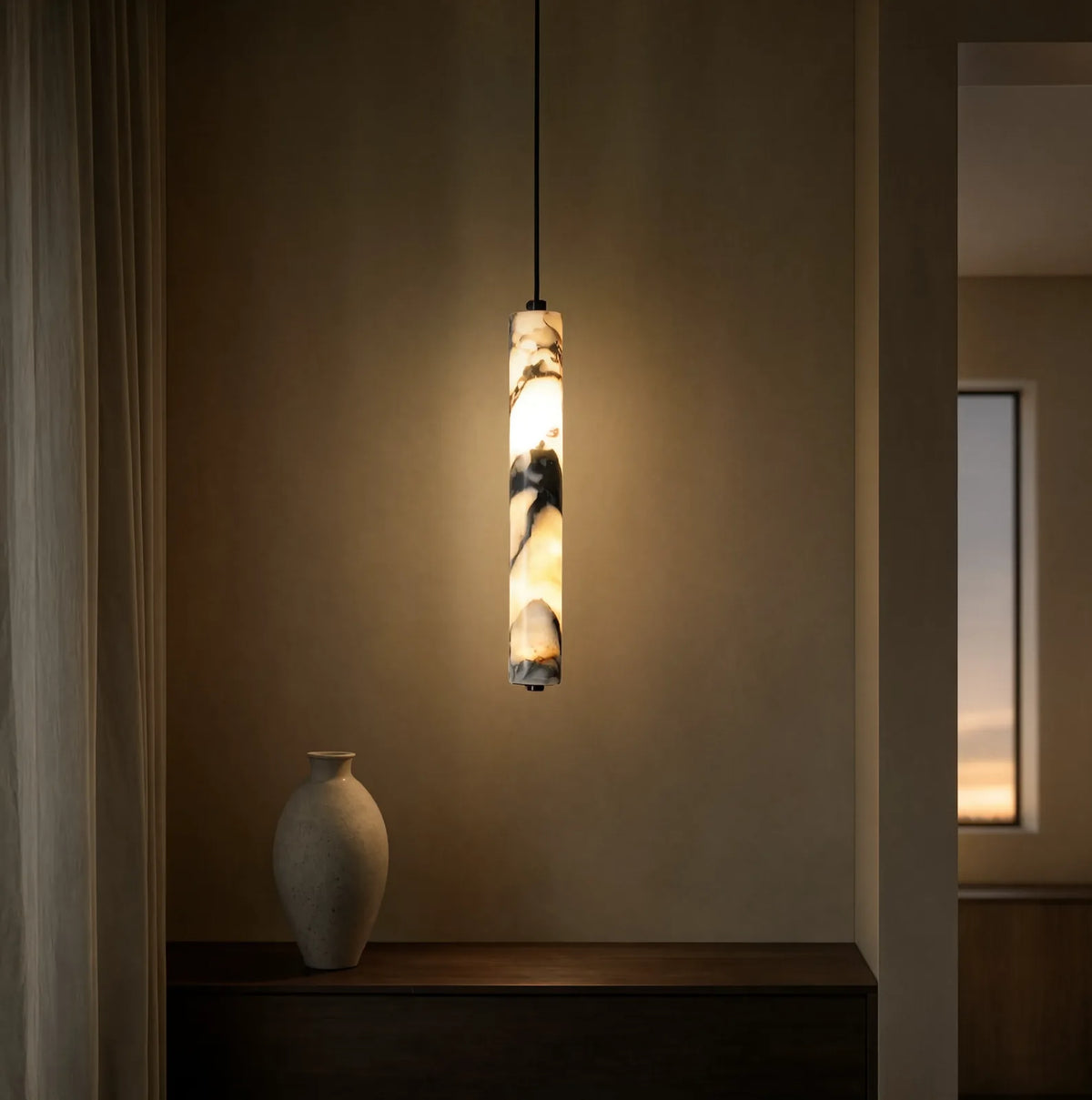Sélinonte slim marble tube pendant light – shown in a room setting
