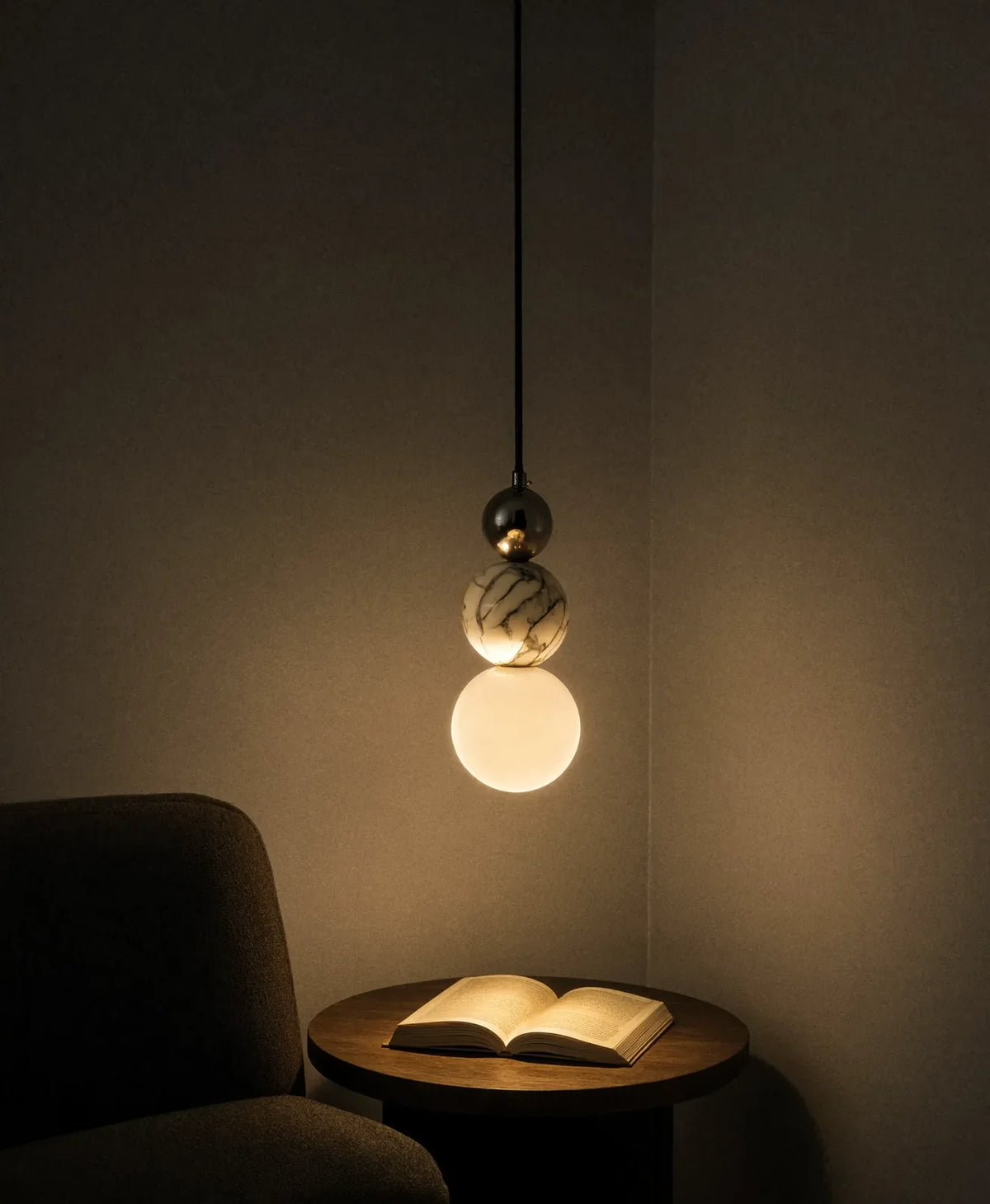 Locres marble and opal glass globe pendant light – shown in a room setting (2)