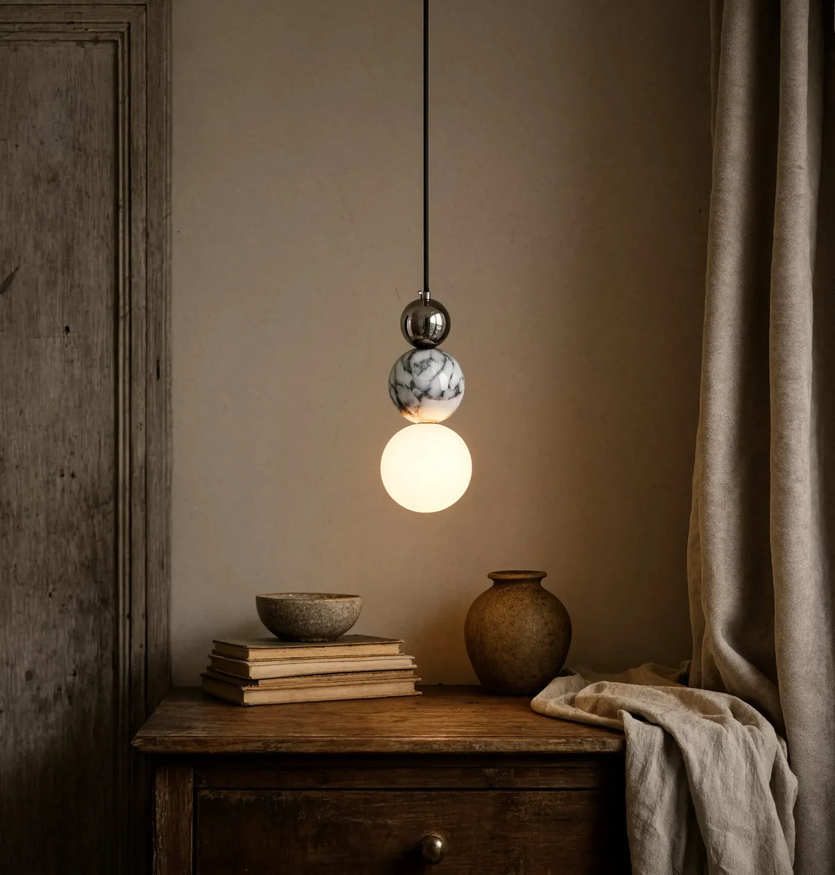 Locres marble and opal glass globe pendant light – shown in a room setting