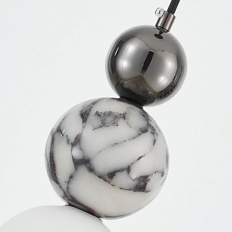 Locres marble and opal glass globe pendant light – close-up detail