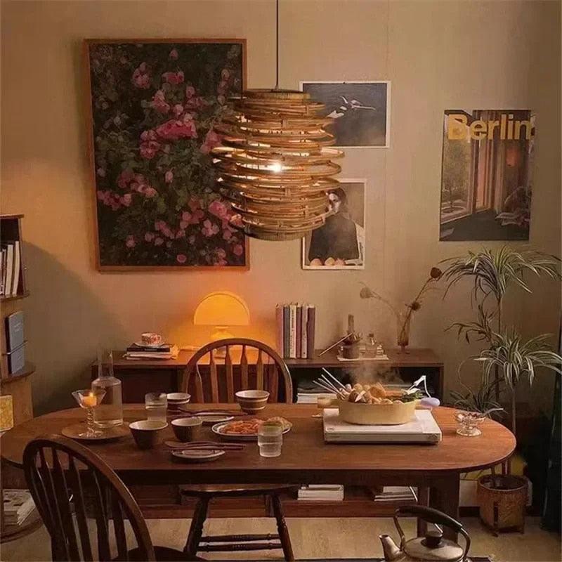 Japanese-style handwoven natural wicker pendant light – shown lit in a room setting (2)