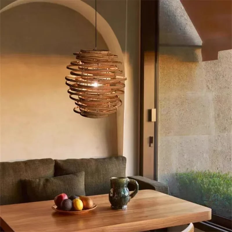Japanese-style handwoven natural wicker pendant light – shown lit in a room setting (3)