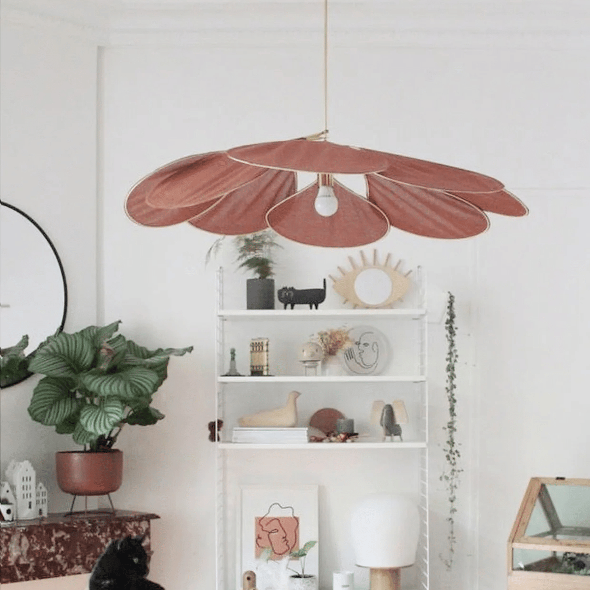 Rattan-look fabric petal pendant light with wide flared petals – shown in a room setting (3)