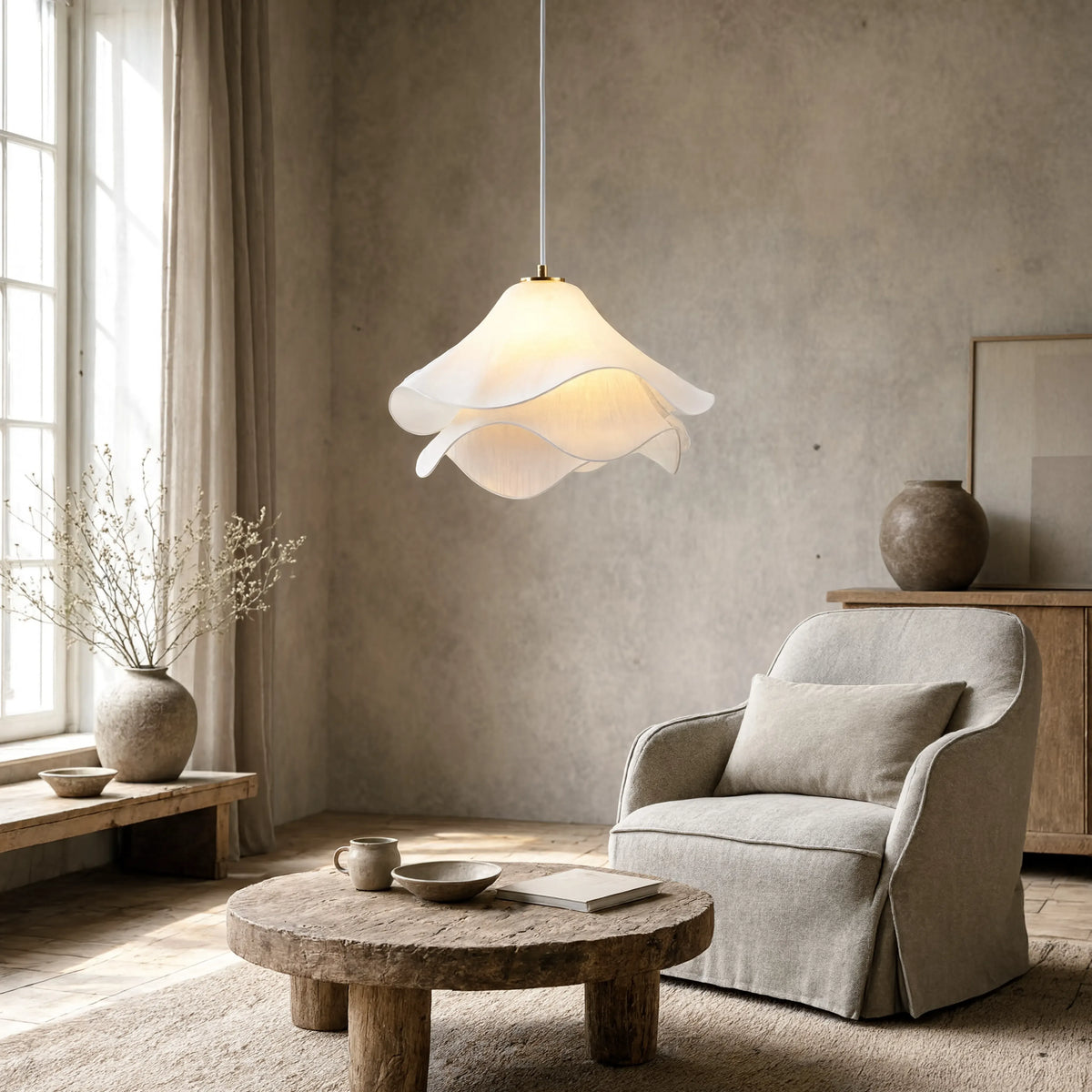 Oia white fabric petal pendant light – shown in a living room (2)