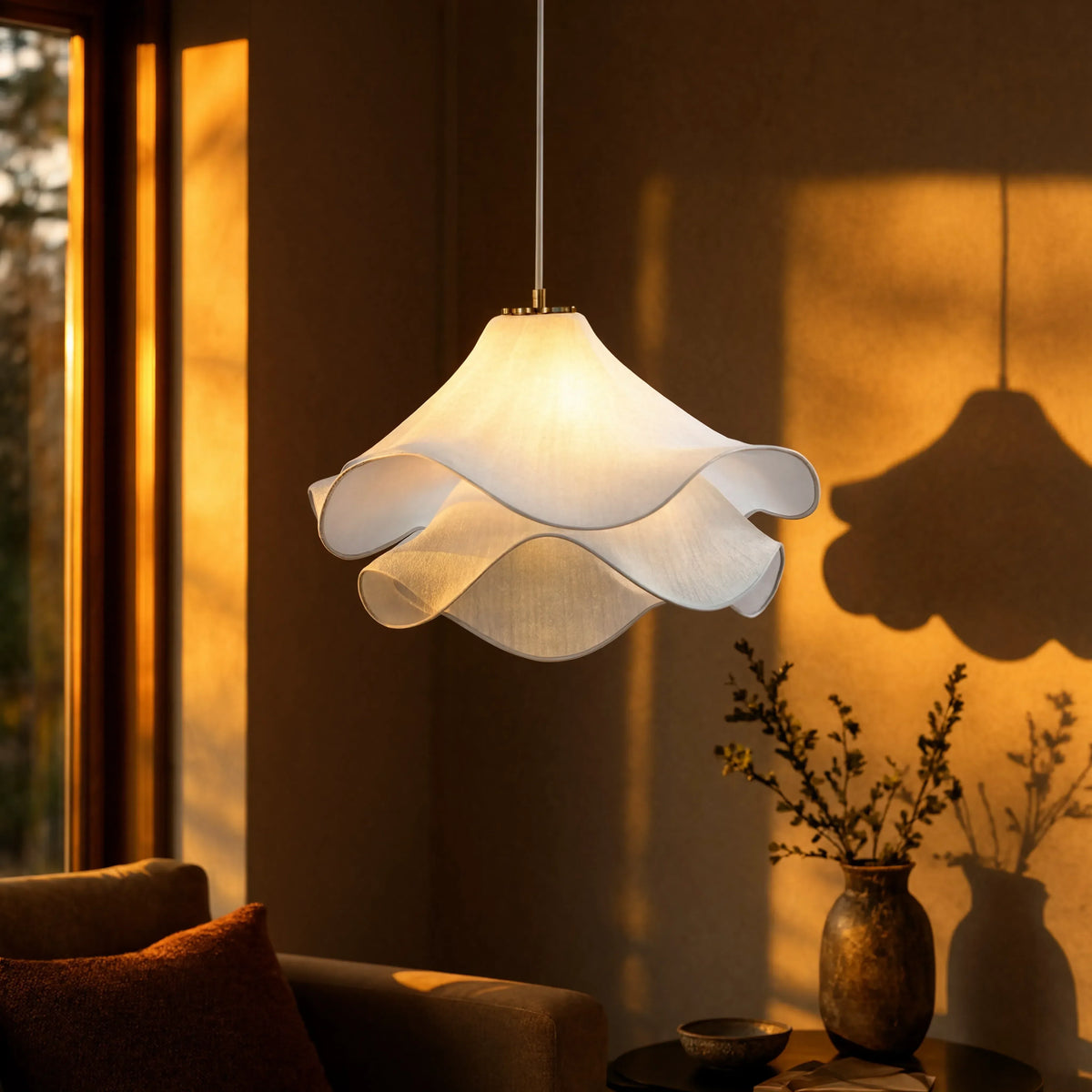 Oia white fabric petal pendant light – shown in a living room (3)