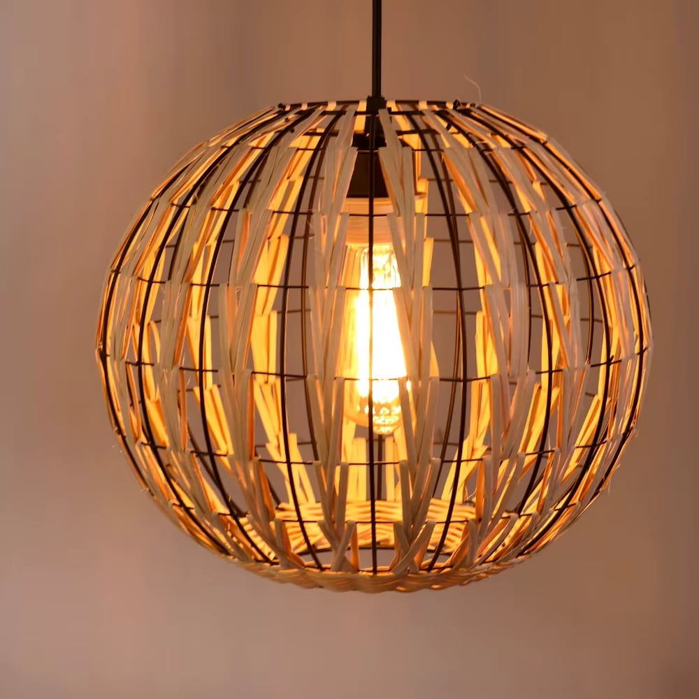 Rustic two-tone beige and black rattan cage pendant light – shown lit