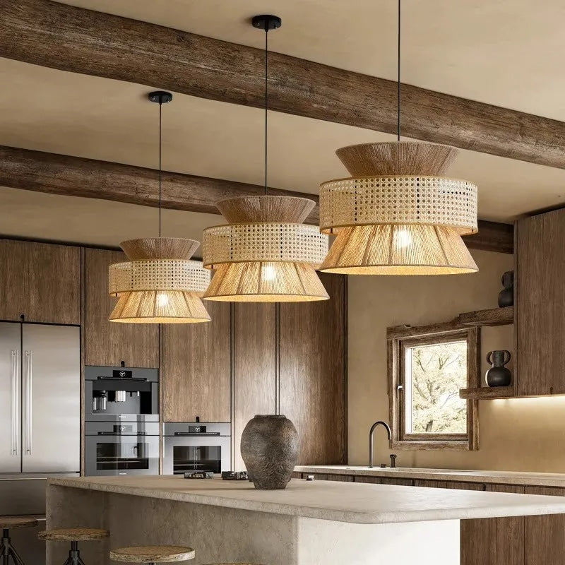 Woven natural rattan pendant light with a slim metal frame – shown in a room setting (2)