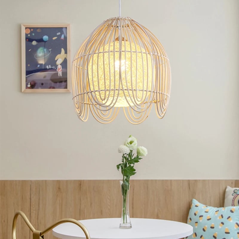 Geometric handwoven rattan, bamboo and wicker pendant light – shown in a room setting