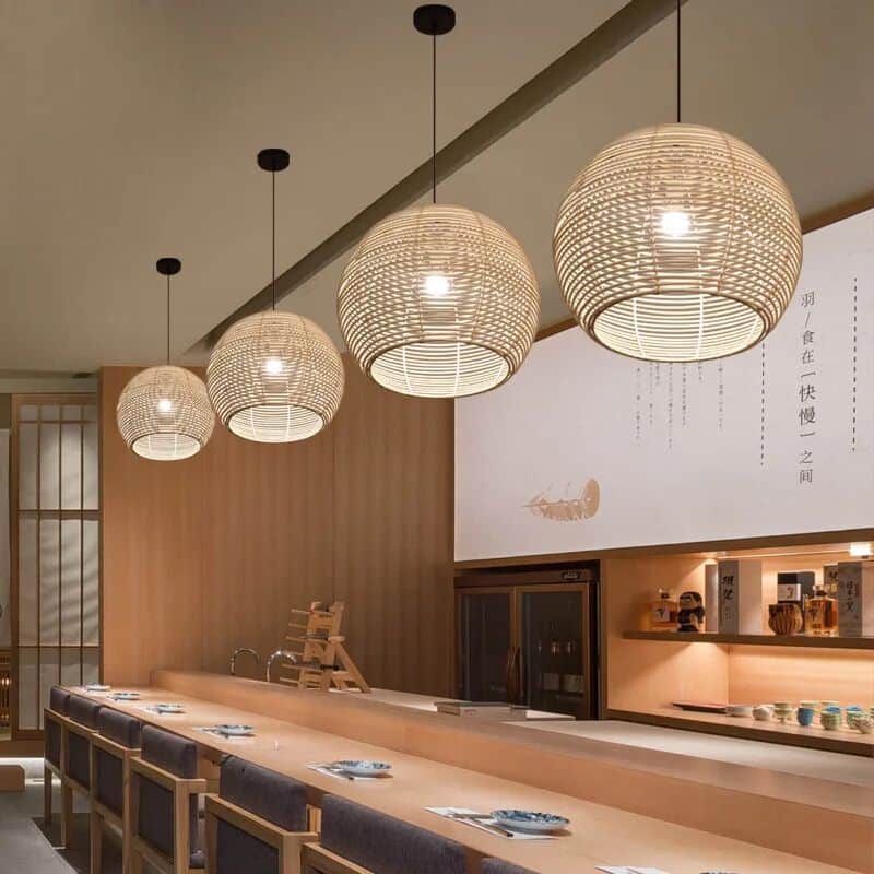 Chinese-style round ribbed rattan LED pendant light – shown in a room setting (3)