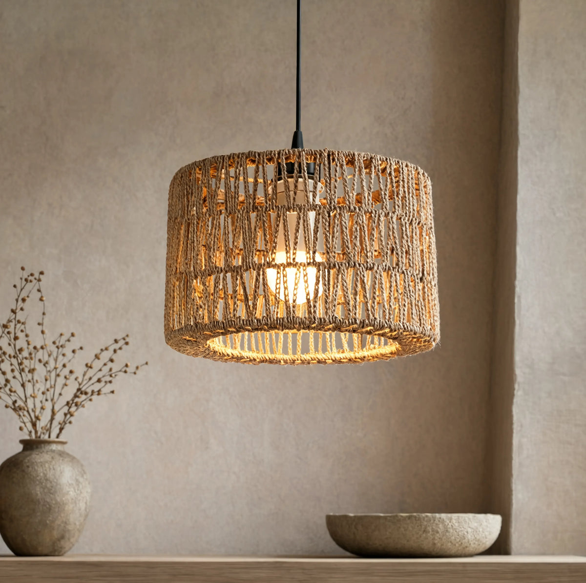 Syros woven jute rope drum pendant light – shown in a room setting (3)
