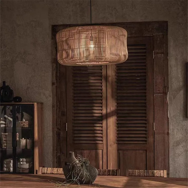 Flared handwoven rattan slat dome pendant light – beige variant, shown in a room setting