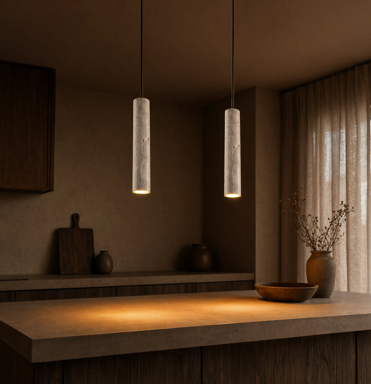 Cumes long travertine tube pendant light – shown in a kitchen (2)