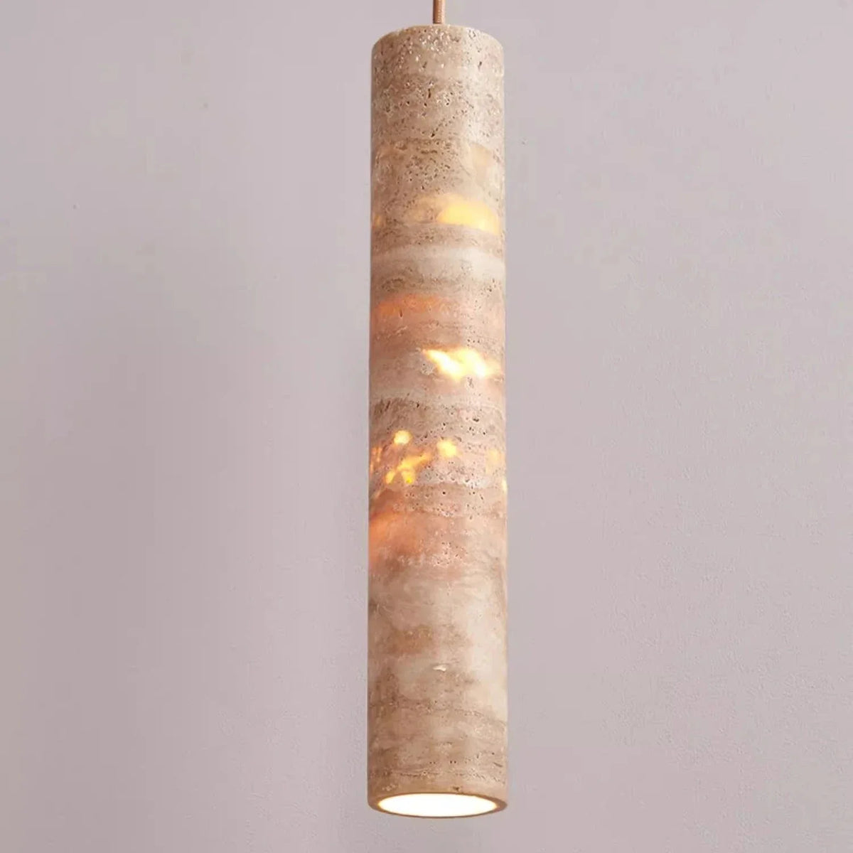 Camarina slim travertine tube pendant light – shown lit