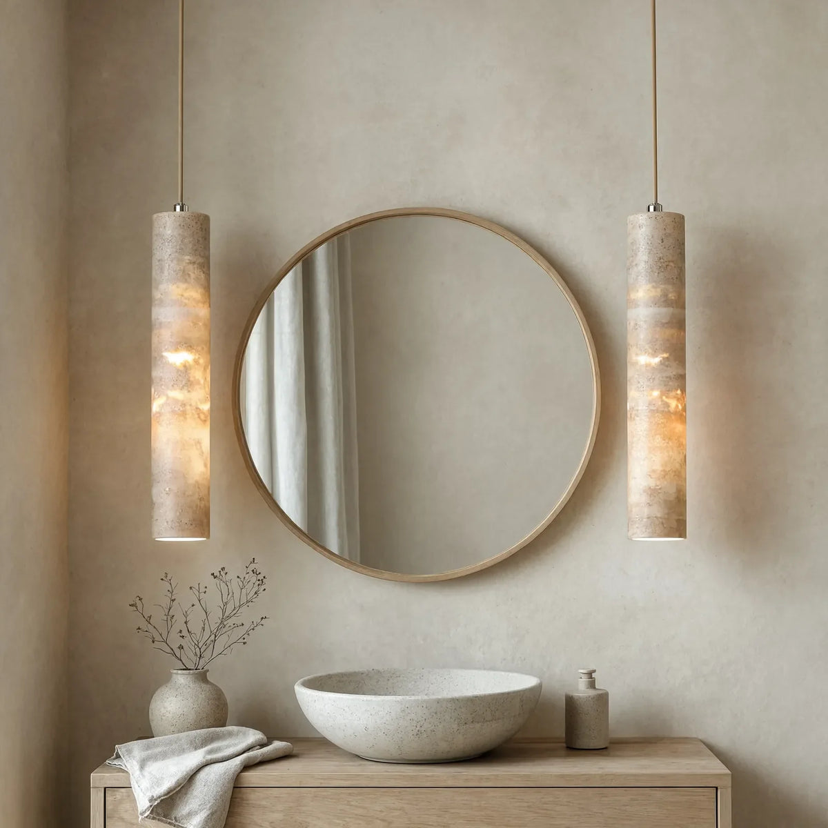 Camarina slim travertine tube pendant light – shown in a bathroom