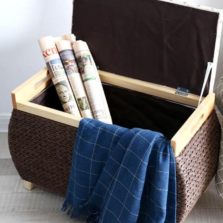 Dark rattan wicker storage stool with a contrasting white lid – close-up detail