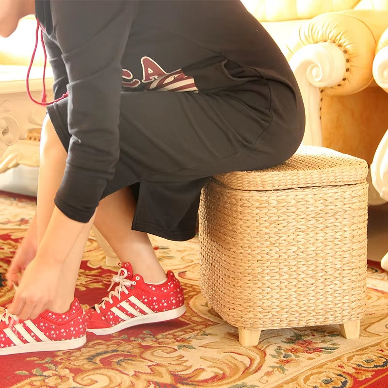 Minimalist honey-toned wicker stool with a storage lid – shown in use