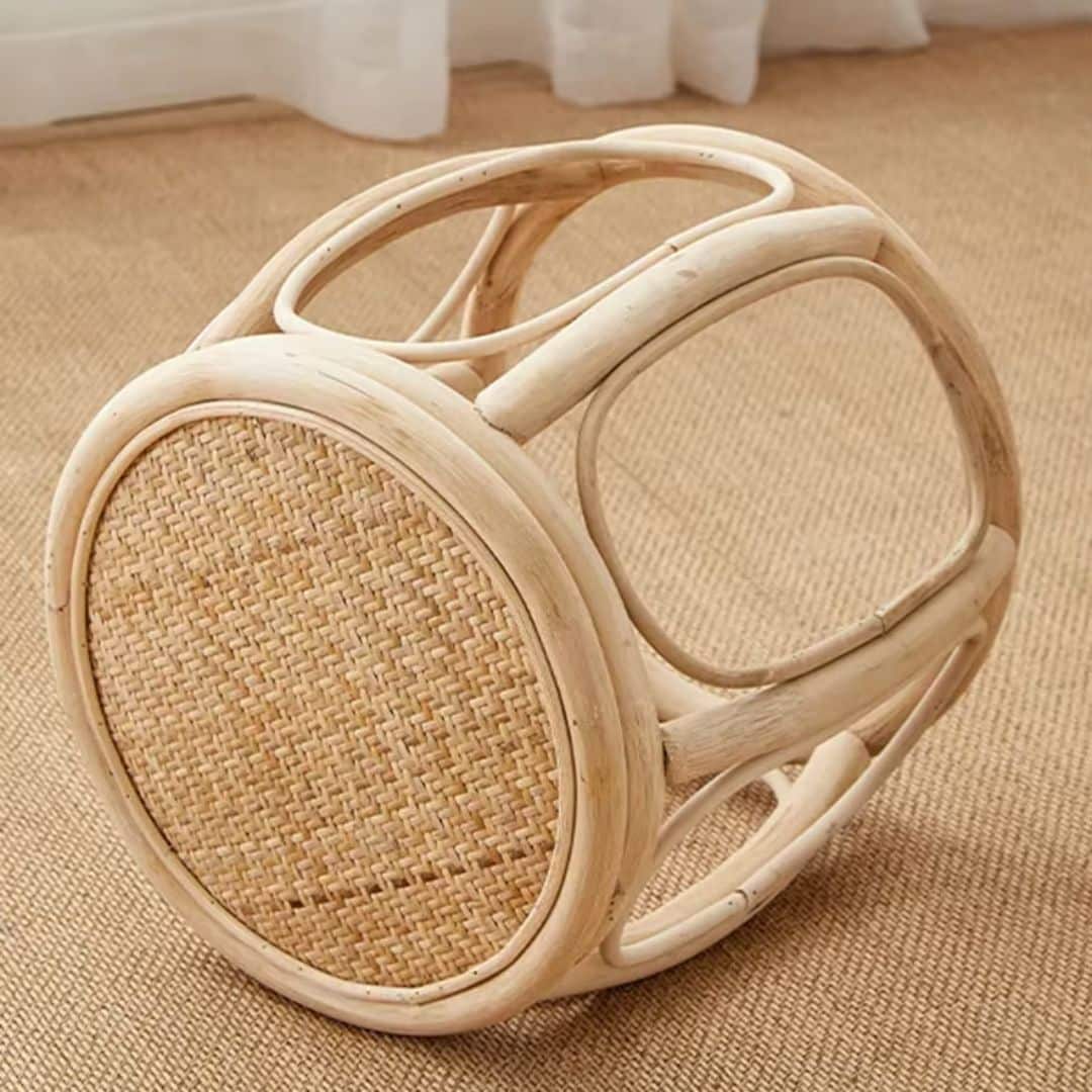 Retro low round wicker stool with a hand-braided seat – close-up detail
