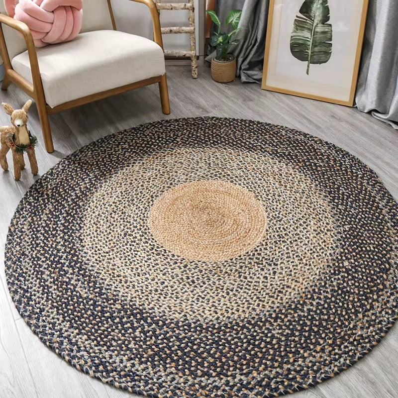 Round bamboo fiber rug with three concentric circles in black, gray and beige – another view
