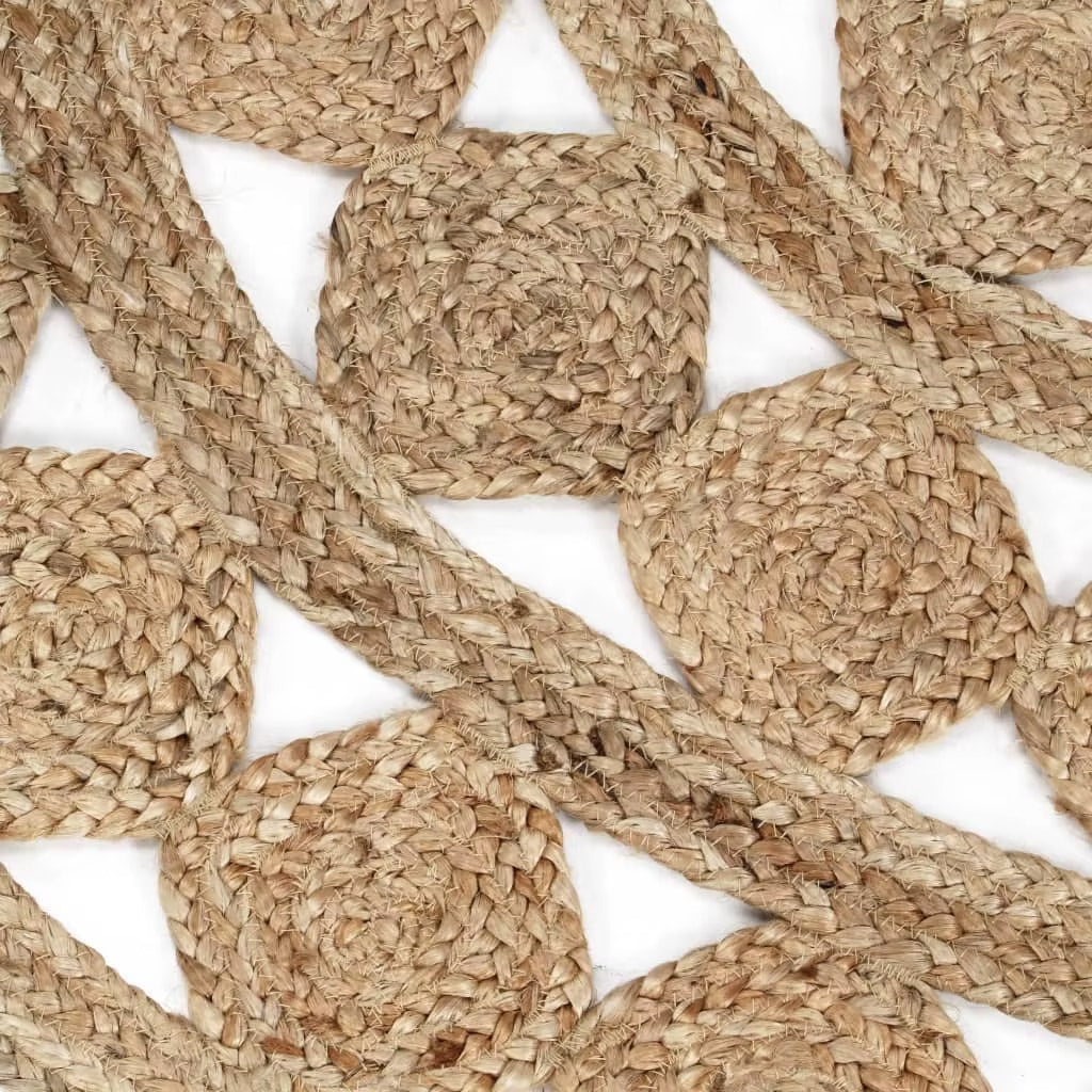 Round tightly woven jute rug in warm beige – close-up detail