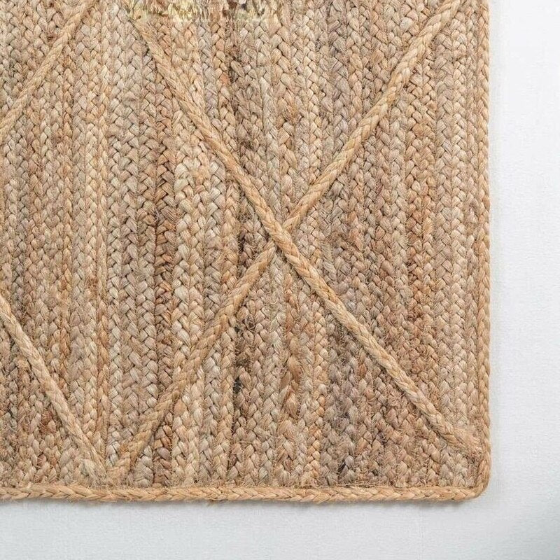 Rectangular rattan rug with a regular cross pattern