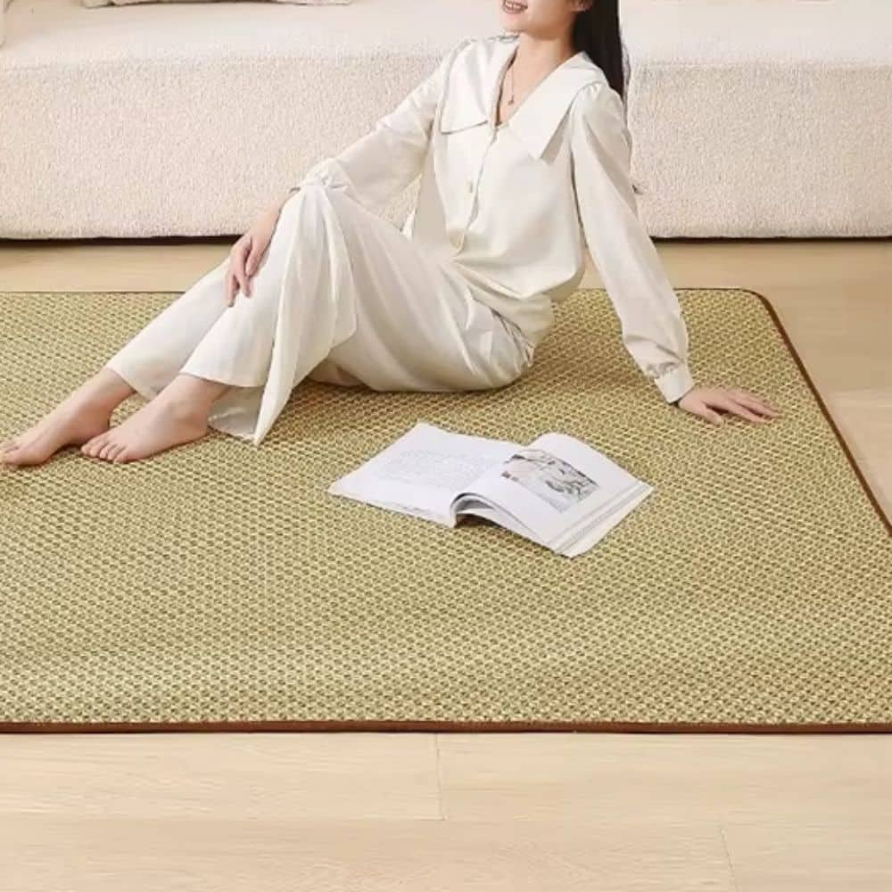 Square rattan rug with a geometric relief pattern – shown in use