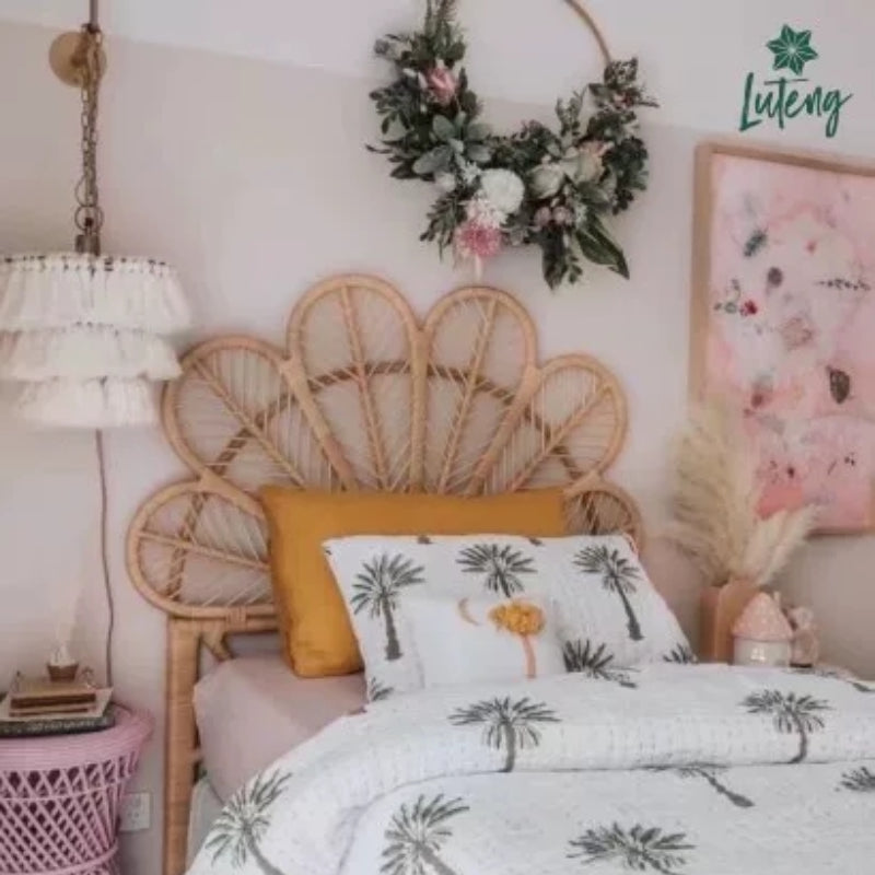 Light rattan headboard shaped as six hand-braided leaves – shown in a room setting (3)