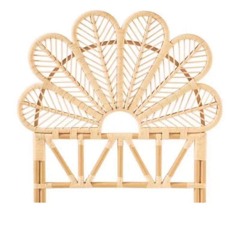 Light rattan headboard shaped as six hand-braided leaves