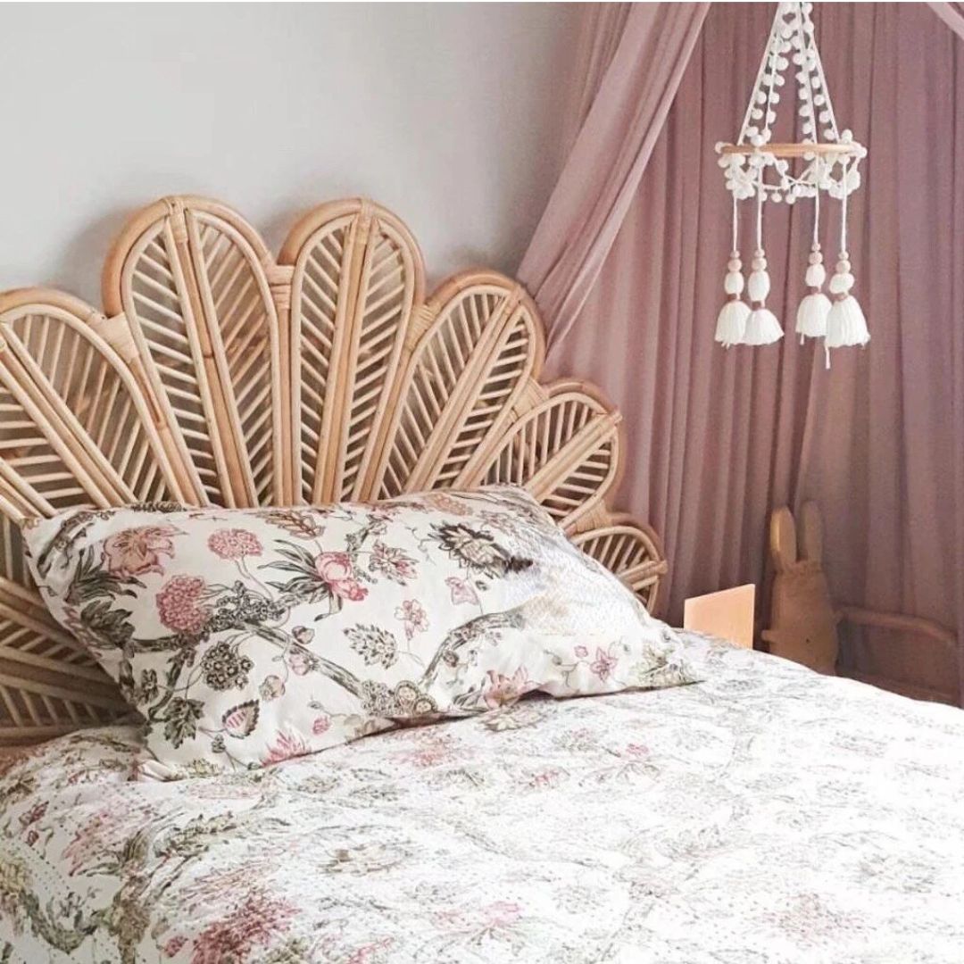 Rattan headboard with hand-braided fanned petals – shown in a room setting (2)