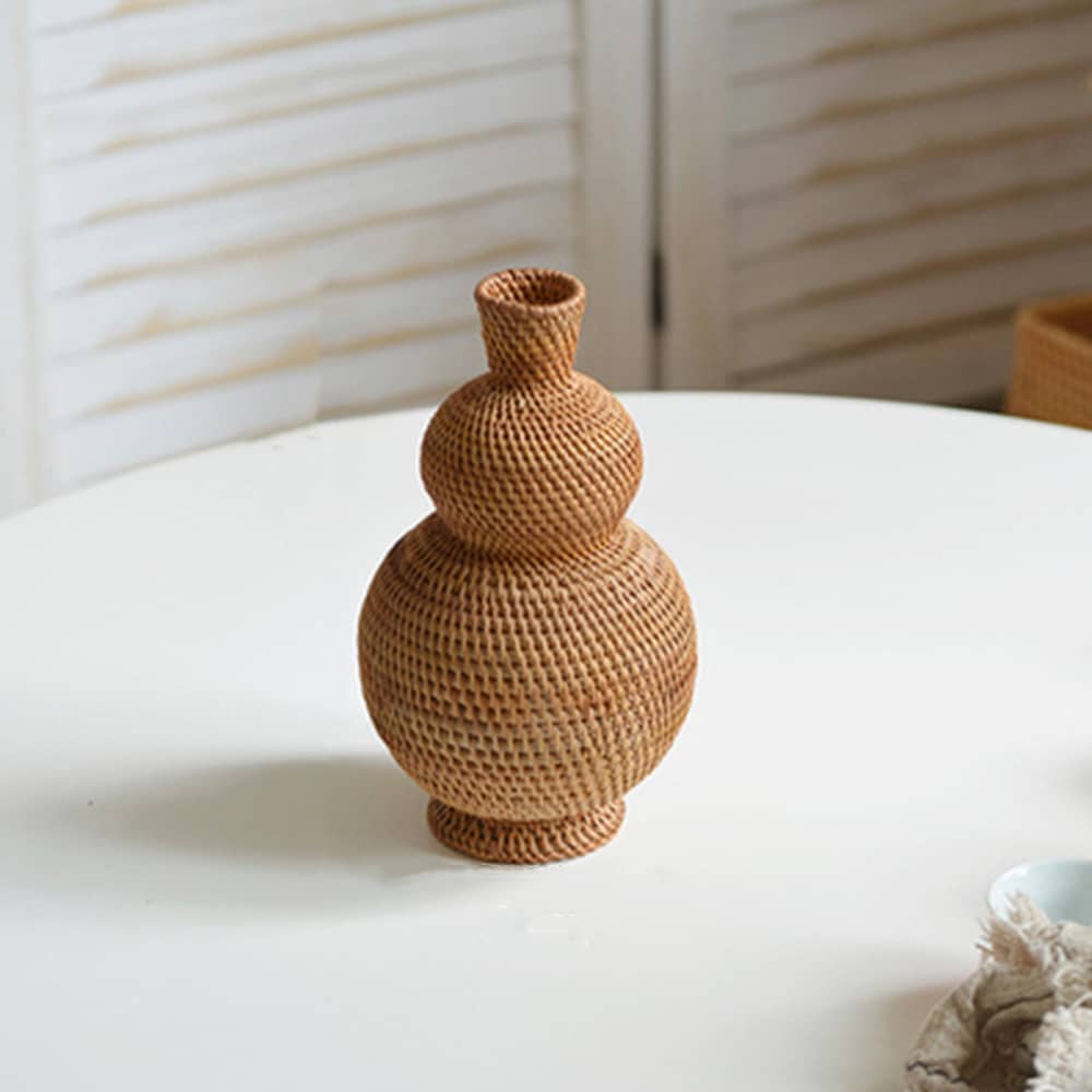 Small woven rattan vase with a narrow neck