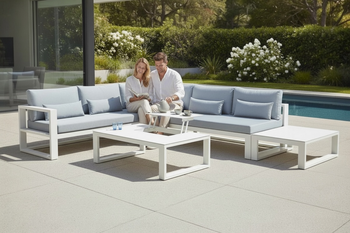 Como aluminum corner lounge set with gray cushions and lift-top coffee table – shown outdoors