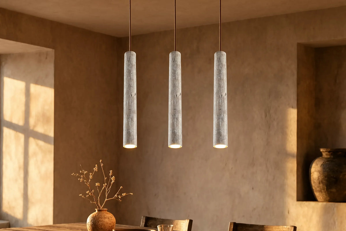 Cumes long travertine tube pendant light – shown in a dining room