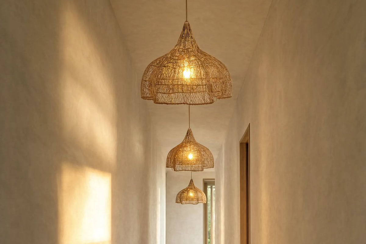 Taormine handwoven scalloped rattan pendant light – shown in a hallway