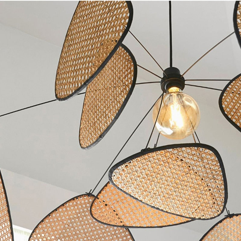 Modern geometric chandelier in rattan with woven bamboo slats – close-up detail