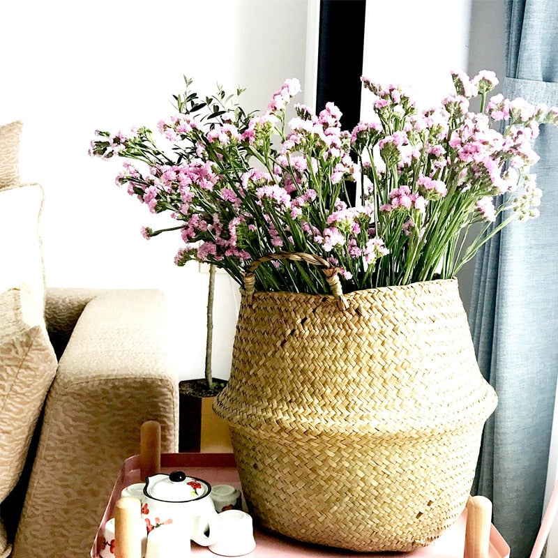 Wicker basket with symmetrical handwoven handles – shown in a room setting (2)