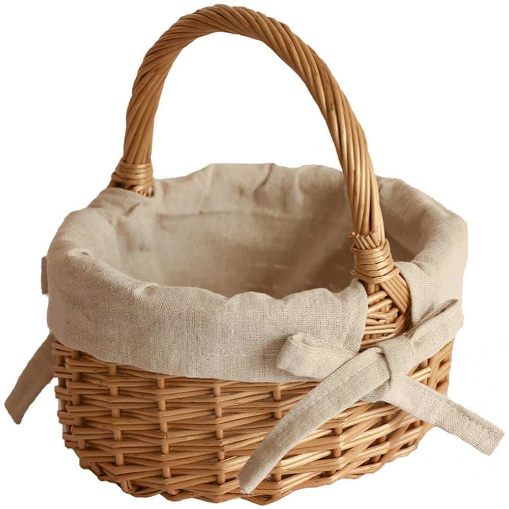 Woven storage basket with a handle and beige fabric lining